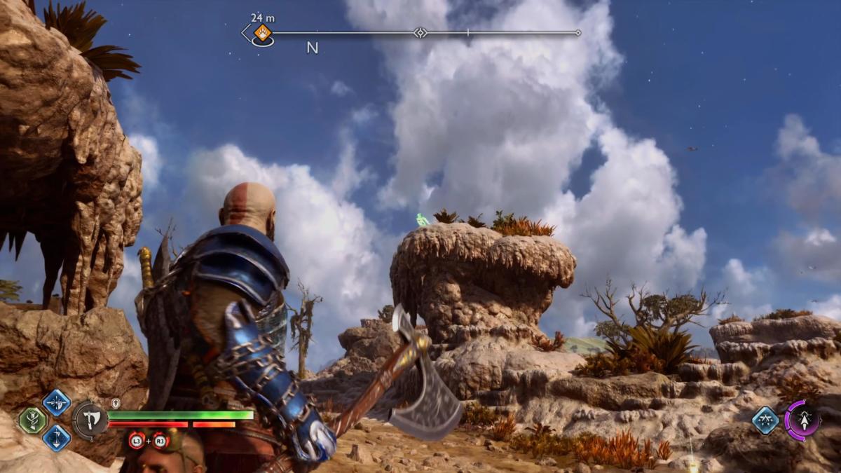 The Aurvangar Wetlands raven is perched on a rock in  God of War Ragnarok.